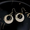 A new, minimalist pearl stud earrings featuring a unique European and American retro fashion style with shiny leather. They are trendy on Instagram for women, exuding a cool and stylish vibe Application Scenario